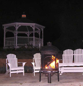 Enjoy an evening by the patio fireplace