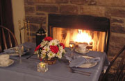 Table set by a romantic fire, Scarlett's Hideaway